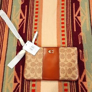 Coach Essential Small Wristlet in Signiture Canvas Tan Rust NWT